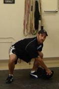 sandbag guide lunge - odd object lifting